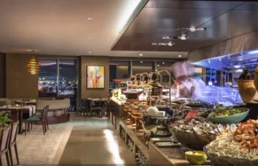 Interior buffet area at Olive Oil restaurant buffet featuring fresh seafood and international dining setup